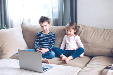 Kids studying at home.