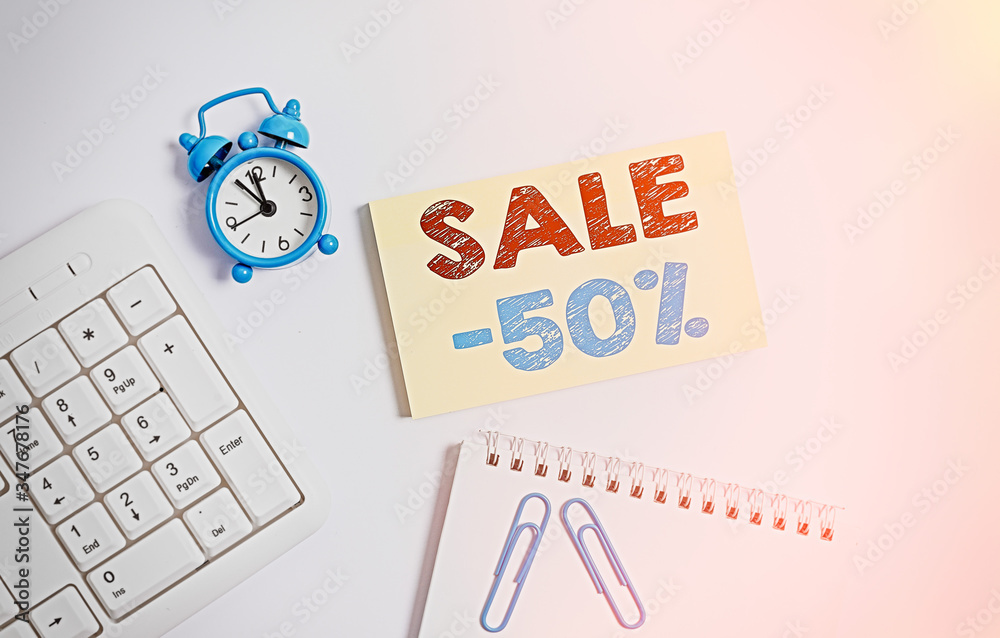 Sticker Writing note showing Sale 50 Percent. Business concept for A promo price of an item at 50 percent markdown Keyboard with empty note paper and pencil white background