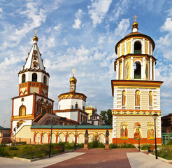 Fototapeta na wymiar The magnificent Epiphany Cathedral in the style of the Siberian Baroque is the oldest Orthodox church in Irkutsk 1741, the main architectural landmark. Multi-frame panorama. Beautiful summer cityscape
