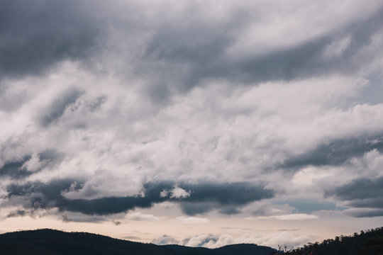 stormy clouds rolling over the mountains in Tasmania