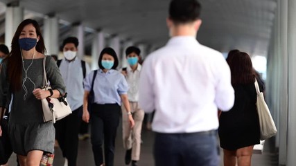 4K Time lapse of asian office worker wear face mask walking in pedestrian walkway - Powered by Adobe