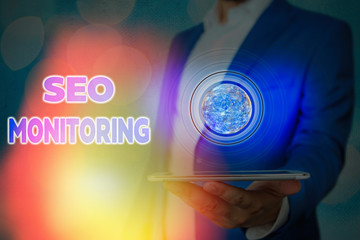Handwriting text writing Seo Monitoring. Conceptual photo Tracking the progress of strategy made in...
