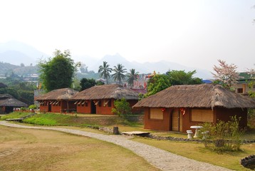 Santichon Village, A house built from clay, modified to bring branches and dry leaves to the roof, is a village in the Yunnan Chinese Cultural Center.