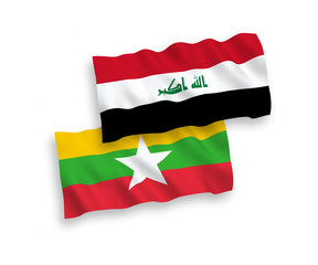 National vector fabric wave flags of Iraq and Myanmar isolated on white background. 1 to 2 proportion.