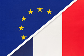European Union or EU vs France national flag from textile. Symbol of the Council of Europe association.