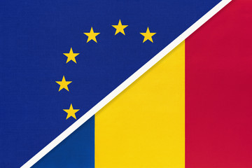 European Union or EU vs Romania national flag from textile. Symbol of the Council of Europe association.