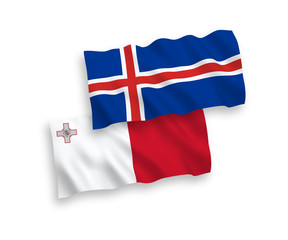 National vector fabric wave flags of Malta and Iceland isolated on white background. 1 to 2 proportion.