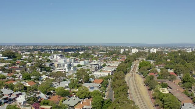 overlooking the city of perth australia in a sunny day n some train tracks