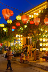 Wonderful evening view of street decorated with lanterns, Hoi An