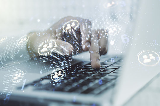 Double exposure of social network icons concept with world map and hands typing on laptop on background. Marketing and promotion concept