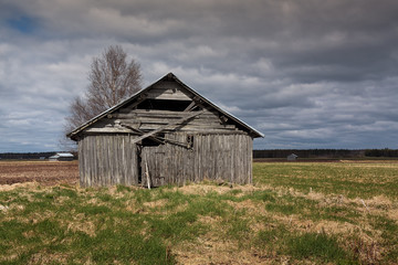 Wooden Barn Houses On The Fields