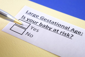 Obraz premium One person is answering question about large gestational age.