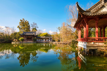 The folk houses by lakeside in autumn in Tanghuang town Huangshan city  Anhui province, China.