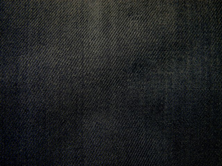 Fototapeta na wymiar The dark texture of cotton fabric