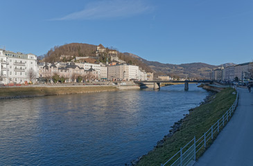 Fototapeta na wymiar Panoramic view of Salzburg Austria on sunny winter day.