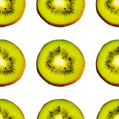 Fototapeta premium Seamless endless pattern of juicy green slices of kiwi fruit isolated on white background. Design for wrapping paper, fabric and wallpaper.