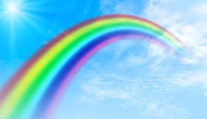 Rainbow background and sky with white clouds	
