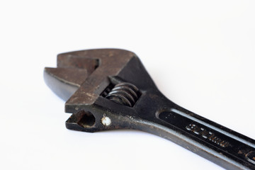 Hand tool, adjustable wrench on white background.