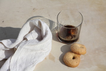 Breakfast by the pool with coffee and donuts. Relaxation and luxury for rest