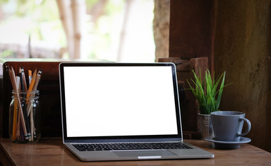 Fototapeta premium Workspace desk and laptop. copy space and blank screen. Business image, Blank screen laptop and supplies.