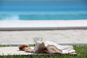 Breakfast by the pool with coffee and donuts. Relaxation and luxury for rest