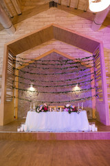 wedding tables in a restaurant with decor and flowers