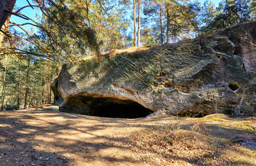 Mysterious cave in the sandstone rock landscape in Blankenburg. Harz Mountains National Park....