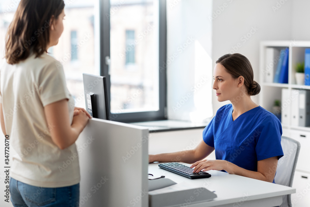 Canvas Prints medicine, technology and healthcare concept - female doctor or nurse with computer and patient at hospital