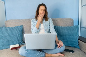Beautiful young woman working from home. Work in home office. Stay at home concept.