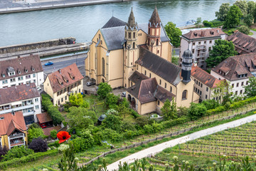 Würzburg, Germany - 10th May 2020: A german photographer visiting the fortress Marienberg, taking pictures of the view over the city at a cloudy day in spring.