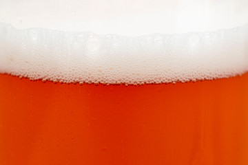 beer foam with bubbles as a background