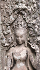 Fototapeta na wymiar Wall carving with dancer apsara, Angkor Wat, Siem Reap, Cambodia