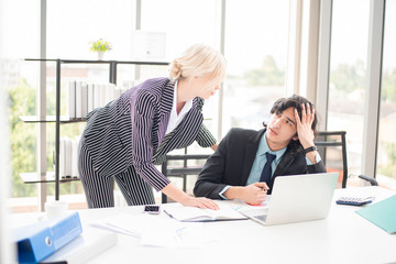 Business people are analyzing financial report