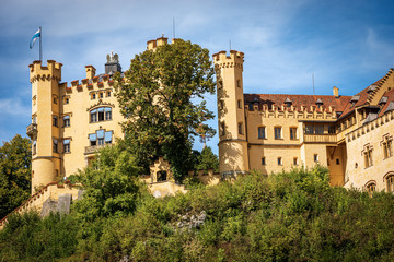 Fototapeta na wymiar Hohenschwangau Castle (Schloss Hohenschwangau - Upper Swan County Palace XIX century), Schwangau village, Bavarian Alps, Germany, Europe.