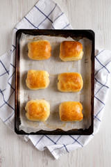 Home-baked Beef Russian Bierocks on tray, top view. Flat lay, overhead, from above.