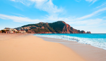 Fototapeta premium Beach of Cleopatra with sea and rocks of Alanya peninsula - Antalya, Turkey