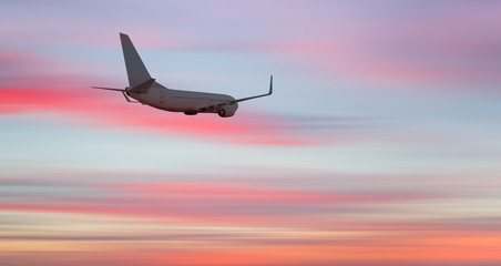 Commerical passenger airplane in the clouds. travel by air transport 