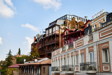 Tbilisi, Georgia - October 21, 2019: Traditional house on the top of rock in downtown in the old center of the city Tbilisi in Georgia in a day