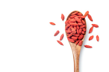Dried goji berries (Chinese wolfberry) in a wooden spoon, Isolated on white background. Top view.