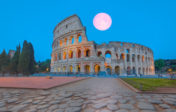 Rome Colosseum is one of the main attractions with full moon - Rome and Italy  " Elements of this image furnished by NASA"
