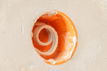 Naklejka premium Repair in the apartment. Socket. Putty knife. Wallpaper.