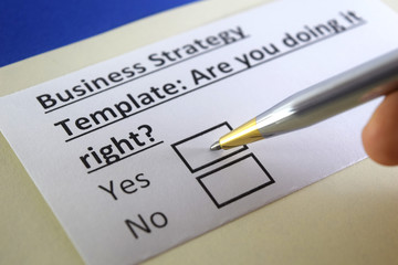 Fototapeta premium One person is answering question about business strategy template.