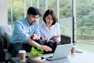 Asian business people working in the outdoors