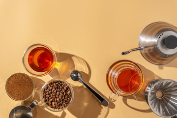 Pour over coffee brewing method, alternative coffee filter,top view,hard light ,beige background