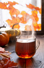 Hot Tea And Autumn Leaves