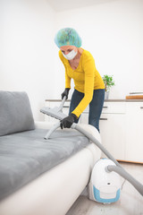 Home, apartment and room sterilization / decontamination, cleaning, vacuuming with vacuum cleaner in the time of dangerous viruses.