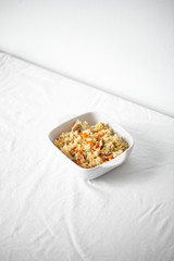 Fototapeta na wymiar Lamb pilaf in a bowl on white background with copy space