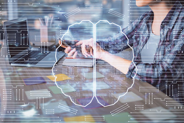 Multi exposure of woman hands working on computer and human brain hologram drawing. Ai tech concept.