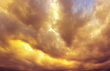 abstract yellow and orange blurred clouds in beautiful sky