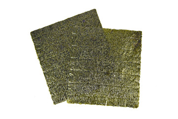 Top view of dried Nori sheets, a Japanese edible seaweed species of red algae genus Pyropia used...